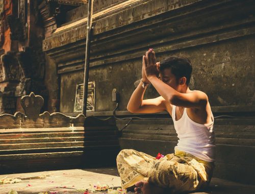 Young man doing yoga.